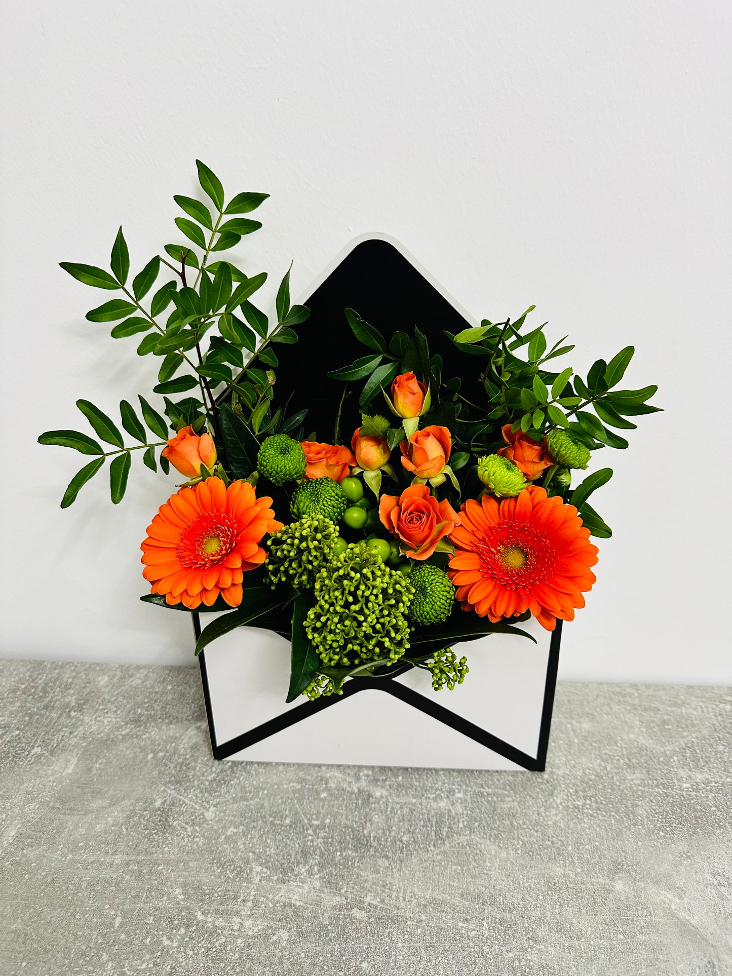 Orange and Green Envelope Arrangement